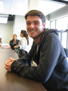 Craig Bourne '15 shows off his smile after discussing OU spirit.