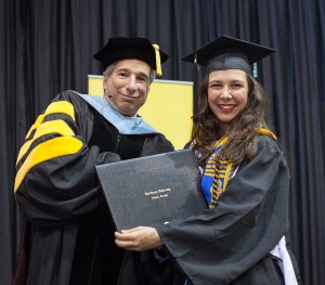 Pictured with President Schall at 2013 commencement. 