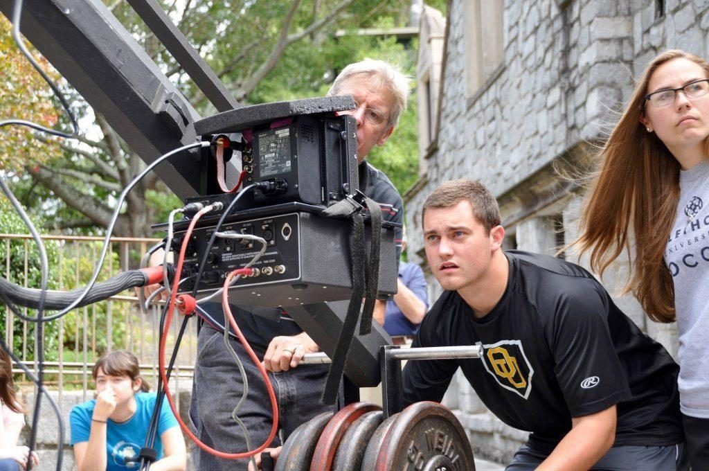 Oglethorpe University students majoring in film production work behind the scenes at their college, an attractive location for filmmakers. (Photo Lisa Larson)