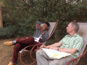 Jay Lutz discusses African literature with Gérard Chenet at the L'Engouement artists' space. Photo: Breaking Away blog
