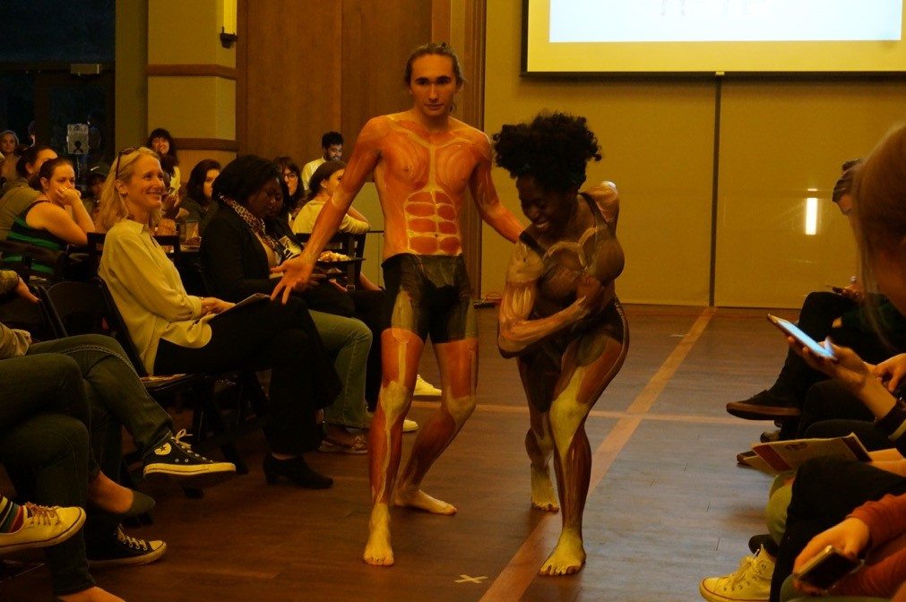The medical fraternity Phi Delta Epsilon hosted a "fashion show" fundraiser featuring illustrated human body systems.