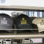 HSB logo hats at the campus store.