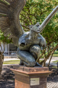 "El Tiempo" statue outside the Conant Performing Arts Center. A winged man on a pedastal.