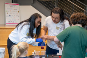 Two Oglethorpe students leading an experiment in the Cousins Center for Science and Innovation.