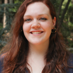 portrait of a young woman with long deep red hair