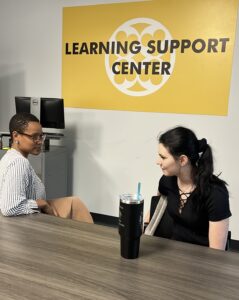 Student success advisor and student chat in the Learning Support Center.